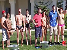 Young Friends Playing Outdoors In A Group Orgy Swing Party Where Everyone Trades Priavte Parts