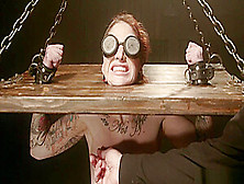 Blindfolded Slave Is Locked In Stocks