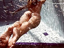 Redhead Girl Submerges And Swims Around Naked Underwater