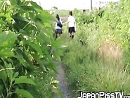 Schoolgirls From Japan Peeing While Taking A Hike