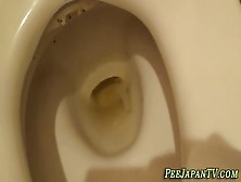 Asian Babe Filmed Pissing