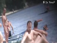 Beach nudist girls show the bodies stretched to crowd