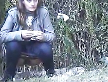 Brunette Babe Pissing In The Wilds