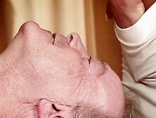 Old man gets oil massage from two beautiful teen girls