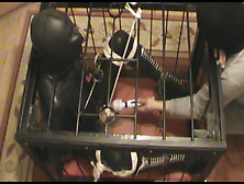 Caged Rubberslave