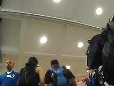 Latin MILF flaunts her butt before an upskirt voyeur