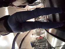 Chick In Tight Pants Walks Around The Store And Filmed By A