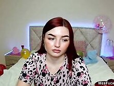 Big tits redhead babe NicolPot strips to bra on solo webcam show
