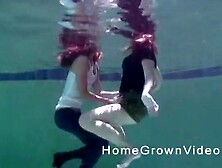 Two kinky lesbians get to finger one another in the pool