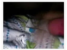 Arousing amateur slut tempts with her ass in bed on cam