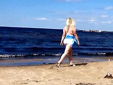 Hot Mom On The Beach In White Swimsuit