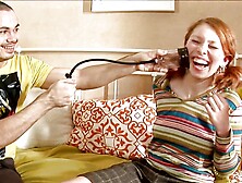 Redhead chick deepthroated on the bed