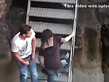 Voyeur Captures A Girl Riding Her Bf On The Stairs In Public