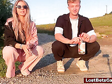 They proceed their Disrobe Bottle Flips game,  laughter and passion filling the air