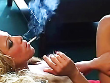 Busty Hottie Smokes Sensually