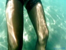 Red Toes And Stocking In The Sea