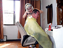 Nudist barbershop.  Nude bitch hairdresser in an apron.  The client is surprised.  web-cam two two