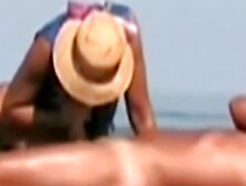 Hot Lady Gives A Handjob At A Beach