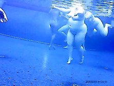 Voyeur Cam Vid Of A Bunch Of Naked People In Pool