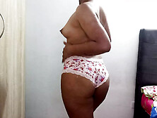 Erotic dance of an 18-year-old girl in her pink panties