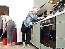 A fat woman has sex with her young husband in the kitchen