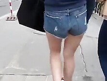 Girl in blue shorts