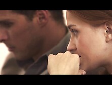 Redhead Consoles Her Man On Red Couch After Bad News.