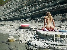 Fantastic kinky nudist hotty in sunglasses sucks & rides a massive vibrator in public beach - Sasha Bikeyeva