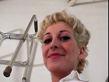 Blonde with a nice rack made to strip and bound by her