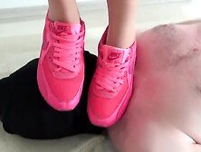 trampling in pink nike sneakers