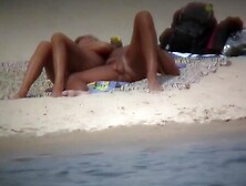 Hot wife flaunts her bushy muff on a nudist beach