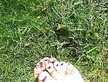 Silky Soft Young Feet Playing In Freshly Cut Grass