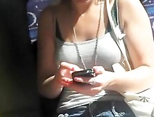 Upskirt sights of a girl texting in the bus