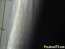 Asian Babe Filmed Pissing