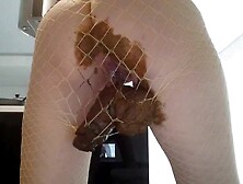 Cute Babe In Fishnet Teasing And Pooping