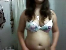 Chubby Girl Strips,  Showers And Masturbates With The Showerhead.