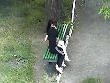 Teen Couple Making Out In Public Park Bench