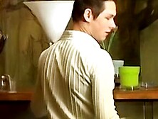Cute gay guy wanks behind bar until he cums in a glass