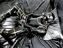 Rubber Gimp Cum Fountain!