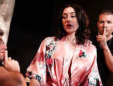 Hot brunette Charlotte Sins pleasures two muscled studs in bed