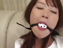 Asian Girl Roped,  Ball-Gagged,  Drooling