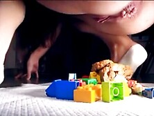 Pretty Teen Shitting On Legos